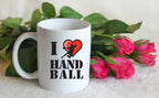 Kubek biały z grafiką piłkarza w sercu i napisem "I love HANDBALL" #2